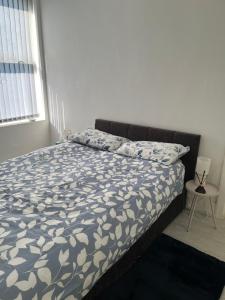 En eller flere senge i et værelse på Santel