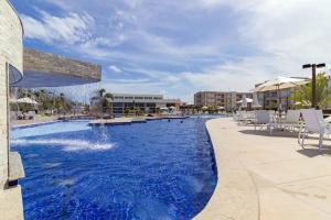 Bazén v ubytování Porto de galinhas flats muro alto nebo v jeho okolí + 9 fotografií