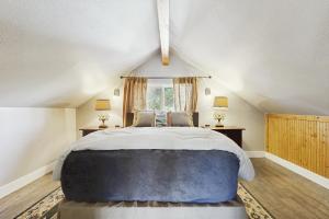 Postel nebo postele na pokoji v ubytování Cottage in the Pines