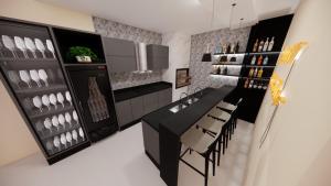 a kitchen with a black table and chairs and a refrigerator at Nosso cantinho in Luis Eduardo Magalhaes