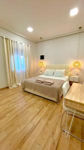 Postel nebo postele na pokoji v ubytování Elia Room & Garden