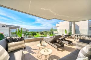 Posedenie v ubytovaní 3070 Cabopino Luxury Apartment