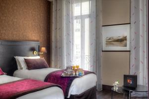 Postel nebo postele na pokoji v ubytování Best Western Plus Nice Cosy Hotel