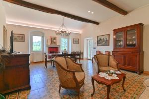 TV a/nebo společenská místnost v ubytování Casa e Mansarda delle Mura