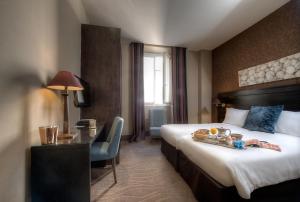 Postel nebo postele na pokoji v ubytování Best Western Plus Nice Cosy Hotel
