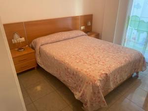 Posteľ alebo postele v izbe v ubytovaní Platja del Port