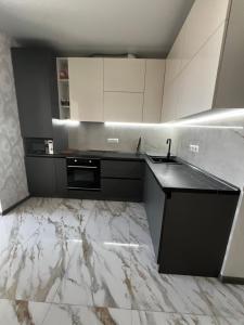 Dapur atau dapur kecil di Комфортна, сучасна квартира в ЖК Учительський