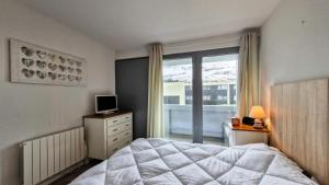 Postel nebo postele na pokoji v ubytování Résidence La Petite Ourse - Appartement rénové · Terrasse · centre station · vue pistes MAE-1931