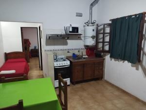 Cuisine ou kitchenette dans l'établissement La Herradura