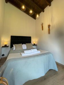 Postel nebo postele na pokoji v ubytování Casa Pepina + 29 fotografií