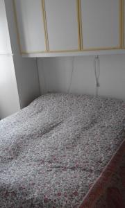 En eller flere senge i et værelse på Appartamento Via Ravina