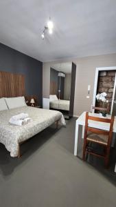 A bed or beds in a room at House Orlando