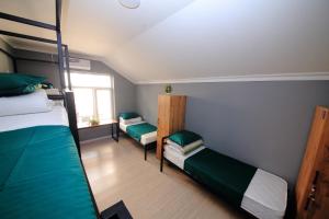 Voodi või voodid majutusasutuse Zam Zam Hostel toas