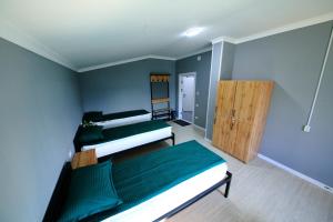 Voodi või voodid majutusasutuse Zam Zam Hostel toas