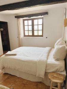 Postel nebo postele na pokoji v ubytování La Bastide des Pins