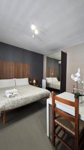 A bed or beds in a room at House Orlando
