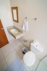 Ein Badezimmer in der Unterkunft Hotel Janaína