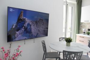 TV a/nebo společenská místnost v ubytování Il Milione