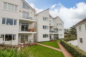 an image of an apartment building with a yard at Godrevy View in St Ives