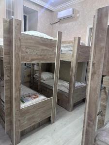 Postel nebo postele na pokoji v ubytování MI Hostel