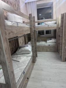 Postel nebo postele na pokoji v ubytování MI Hostel