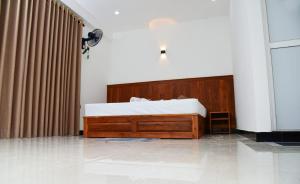 Postel nebo postele na pokoji v ubytování Liyon Hotel