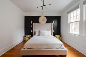 Ένα ή περισσότερα κρεβάτια σε δωμάτιο στο Stay Portland - Elegant World's Fair 4BR Home 97 WalkScore