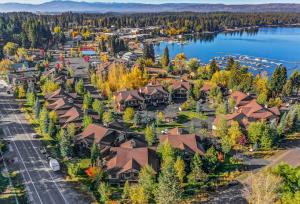 an aerial view of a resort with a lake at Lady Luck by the Beach - Downtown Greystone unit with air conditioning in McCall