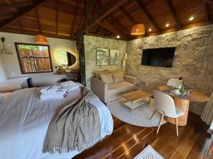Cama ou camas em um quarto em I'Lumiar Loft