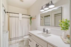 a white bathroom with a sink and a mirror at Stay Portland - Perfect Portland Farmhouse Loft - Breweries & Bars in Portland