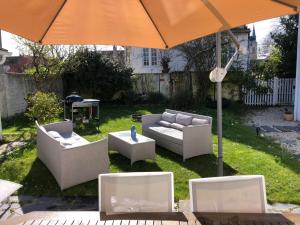 Ogród w obiekcie Très jolie Villa Bianca, maison avec jardin privé à Deauville