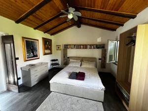 Postel nebo postele na pokoji v ubytování La corte di Bacco