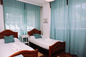 Ένα ή περισσότερα κρεβάτια σε δωμάτιο στο Balcón mágico en Redondela by CABANA Rentals