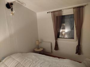 En eller flere senge i et værelse på appartement 56 m2 et grande terrasse 30m2