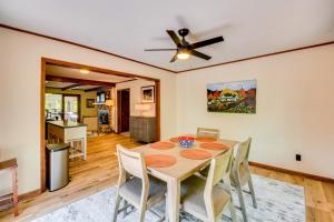 a dining room with a table and chairs at Deck and Game Room Mountaintop Hideaway in Tiger! in Tiger