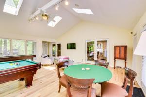 a living room with a table and a pool table at Deck and Game Room Mountaintop Hideaway in Tiger! in Tiger