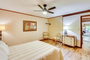 a bedroom with a bed and a ceiling fan at Deck and Game Room Mountaintop Hideaway in Tiger! in Tiger