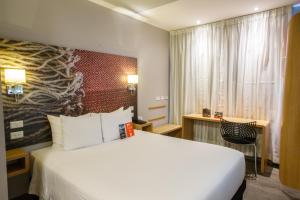 Voodi või voodid majutusasutuse ibis Quito toas