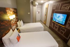 Voodi või voodid majutusasutuse ibis Quito toas