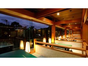 a building with a pool table on a balcony at Kinugawa Park Hotels - Vacation STAY 96213v in Nikko