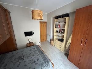 Postel nebo postele na pokoji v ubytování Appartamento fronte mare sulla riviera di ponente