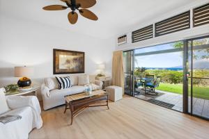 a living room with a couch and a table at Kapalua Ridge Villa 2712 in Kapalua
