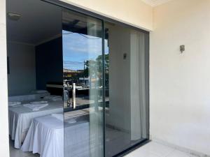 Postel nebo postele na pokoji v ubytování Oasis Praia Hotel