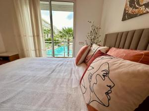 Voodi või voodid majutusasutuse Cosy and stylish Condo in Bouznika toas +14 fotot