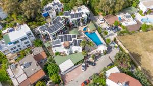 an overhead view of a house with solar panels on it at Orion hotel in Bodrum City
