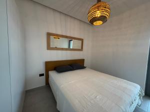Ένα ή περισσότερα κρεβάτια σε δωμάτιο στο Previllage Red Apartments 9-10-11
