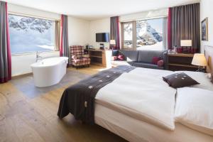 Ένα ή περισσότερα κρεβάτια σε δωμάτιο στο Frutt Mountain Resort +161 φωτογραφίες