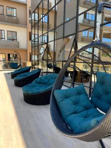 Ruang duduk di Apartamento Altiplano Conforto e Mar +15 gambar