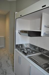Kuchyň nebo kuchyňský kout v ubytování Lodges le Mura