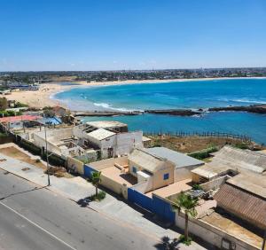 a view of a beach with houses and the ocean at Rita in Mohammedia